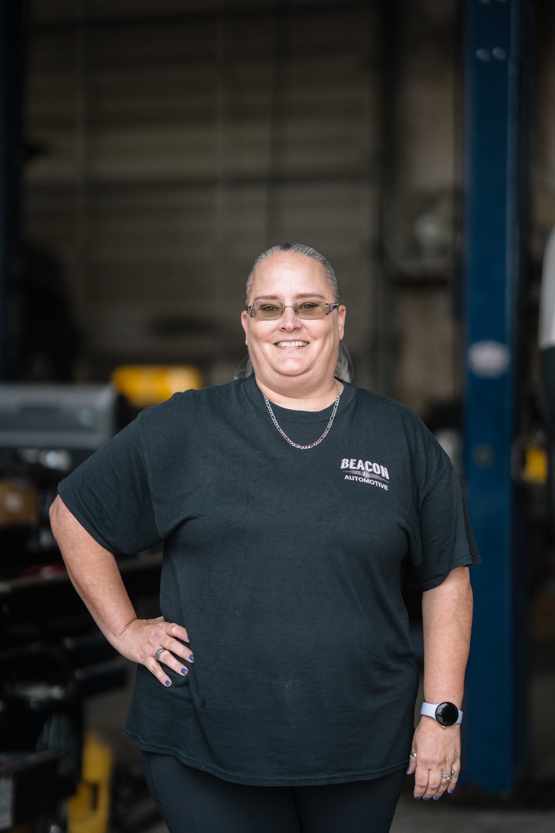 Beacon Automotive team member smiling in the shop