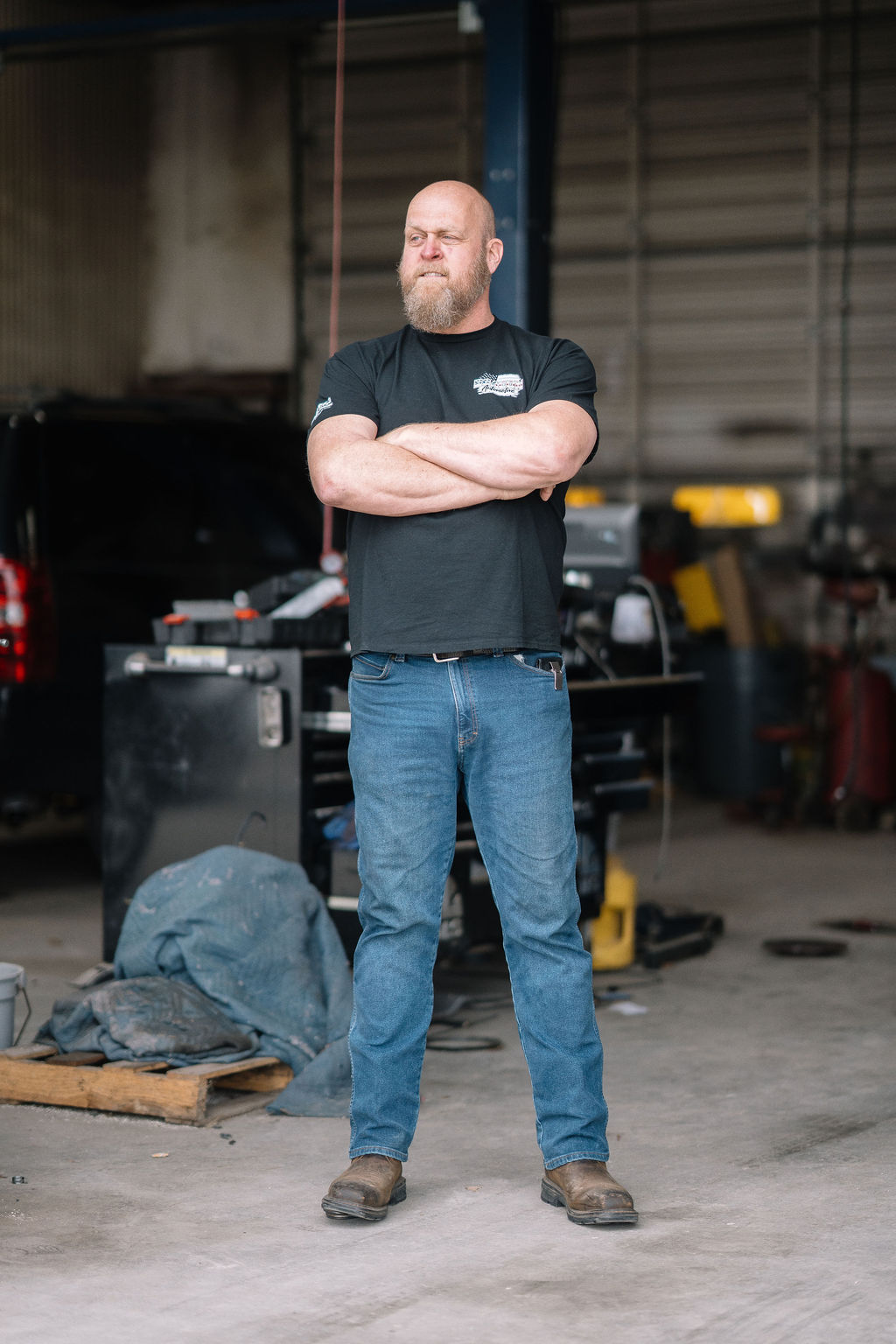 Jeff Hawn standing in the Beacon Automotive shop